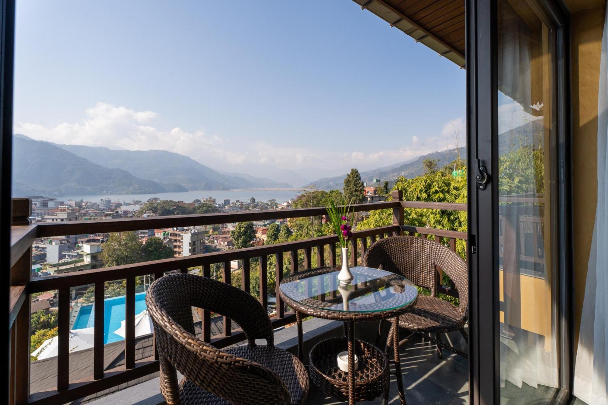 Bar Peepal Resort ポカラ エクステリア 写真 A view of Lake Biwa from a guest room