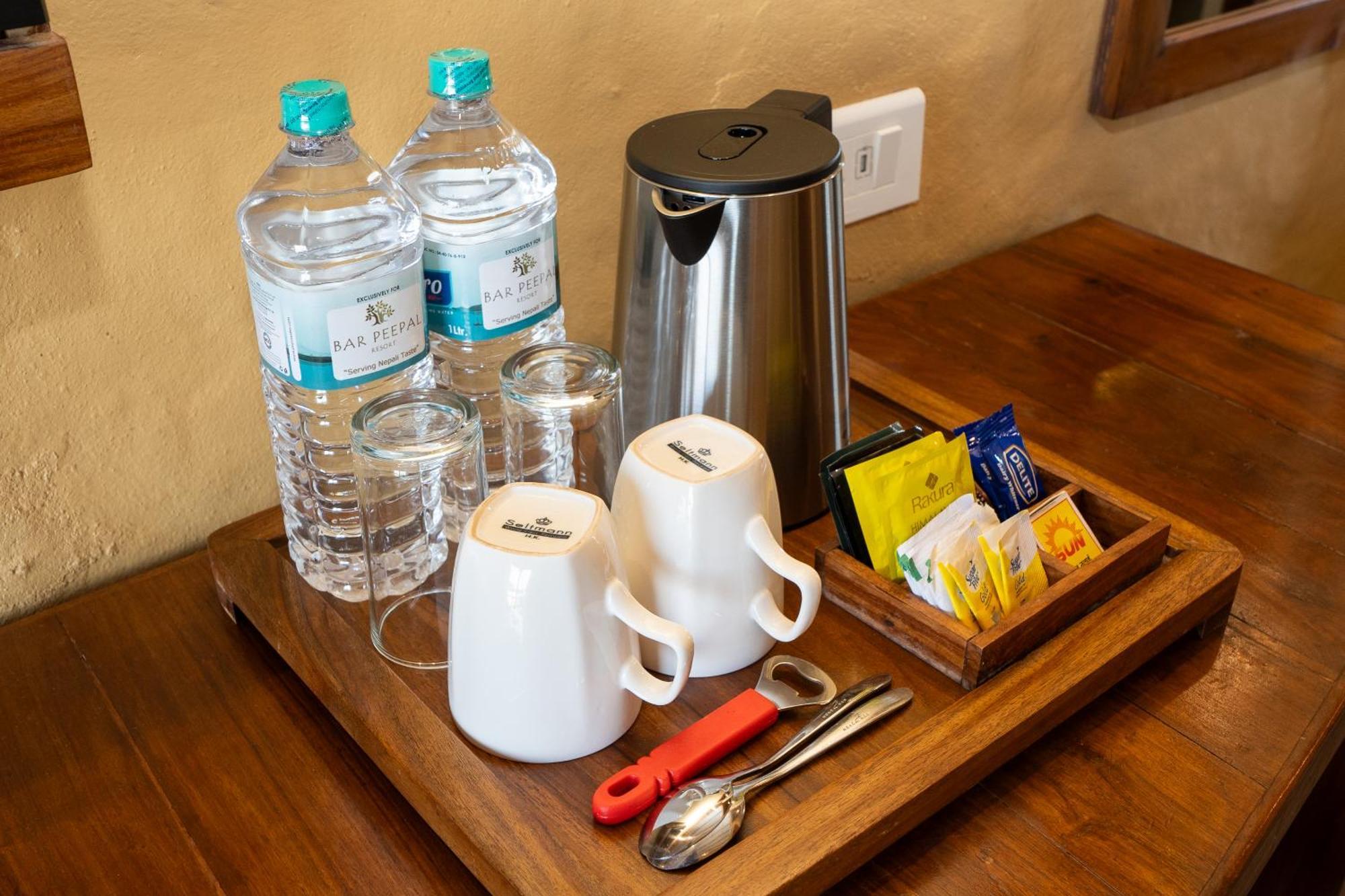Bar Peepal Resort ポカラ エクステリア 写真 A tea tray